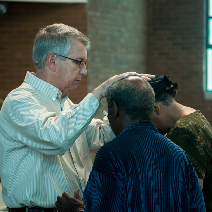 Minton Praying at Healing School